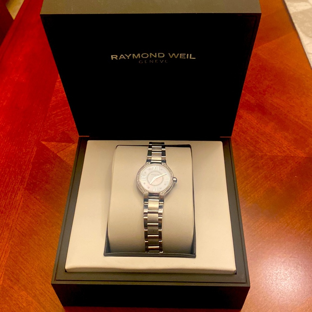Brand NEW Raymond Weil watch in original packaging. Mother of pearl and diamonds